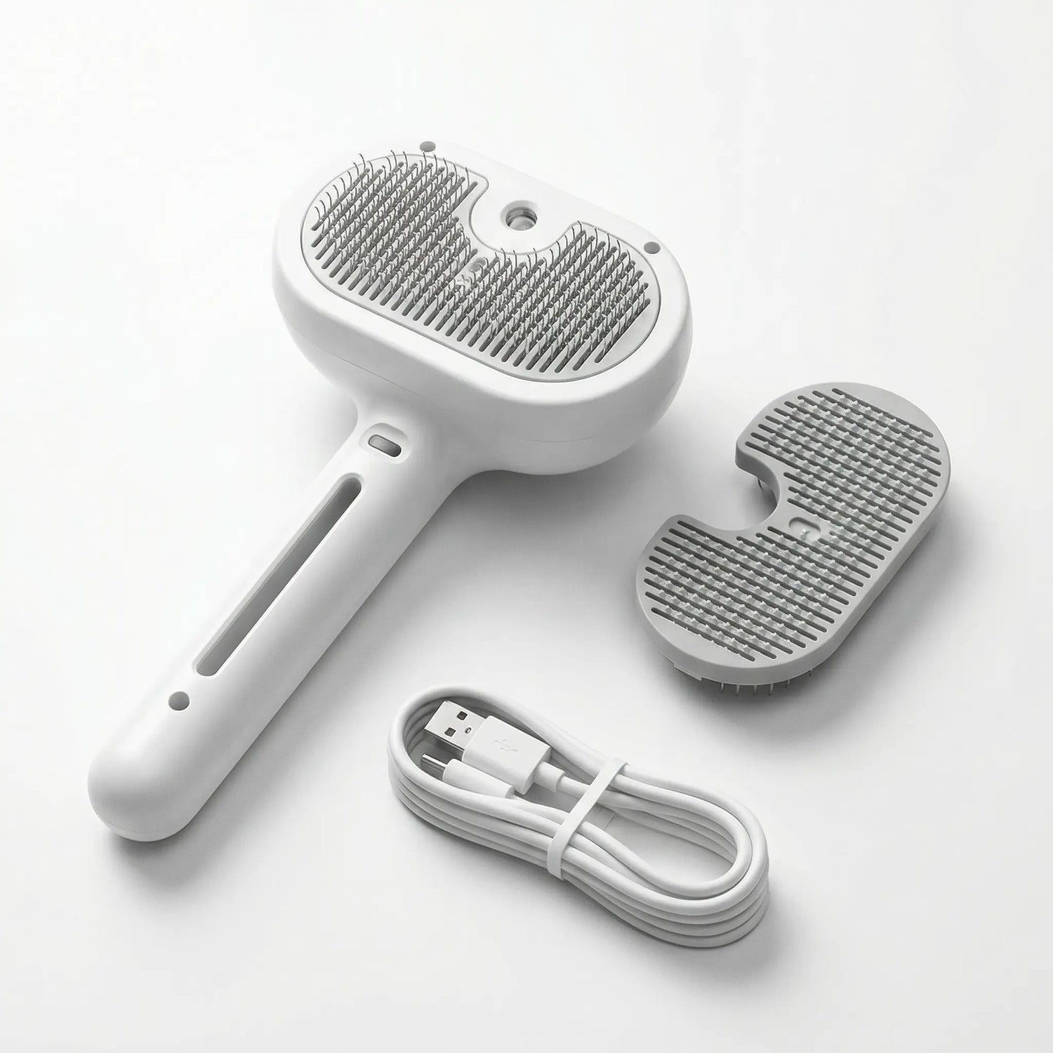 Brosse de toilettage spray pour animaux